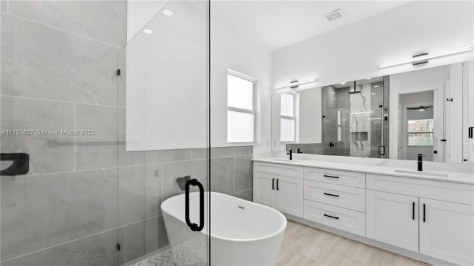 Bathroom, Dual Sink Vanities, Free Standing Baths, Glass Shower, Interior, Wood Texture Flooring