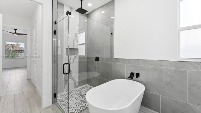 Bathroom, Free Standing Baths, Glass Shower, Interior, Recessed Lighting, Wood Texture Flooring