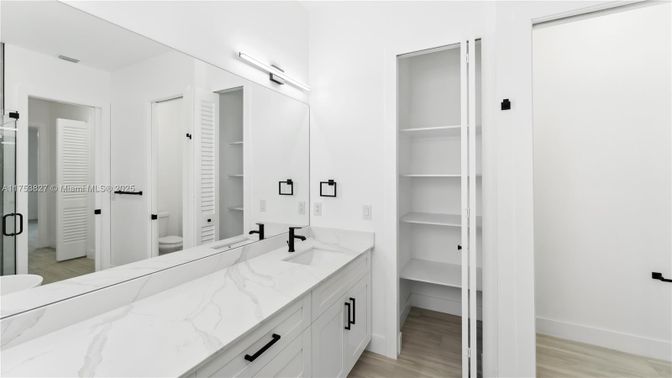 Bathroom, Dual Sink Vanities, Interior, Walk-in Closets, Wood Texture Flooring