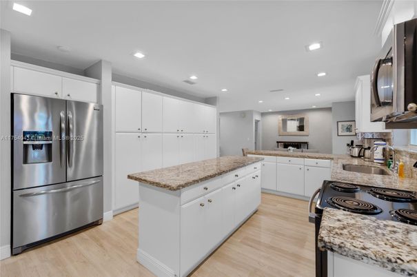 Interior, Kitchen, Recessed Lighting, Stainless Steel Appliances, Wood Texture Flooring