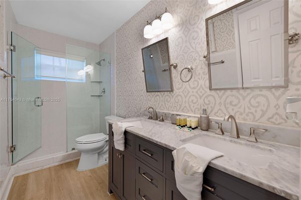 Bathroom, Dual Sink Vanities, Glass Shower, Interior, Wood Texture Flooring