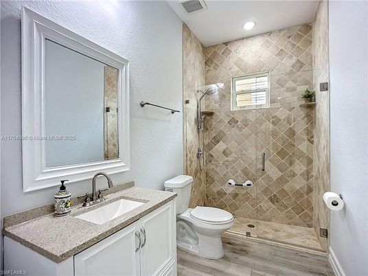 Bathroom, Glass Shower, Interior, Recessed Lighting, Wood Texture Flooring