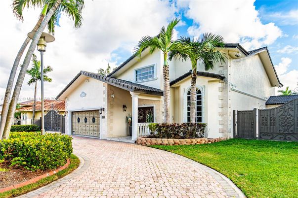Attached, Backyard, Exterior, Facade, Spanish Mediterranean