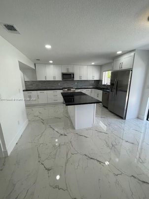Interior, Kitchen, Marble, Recessed Lighting, Stainless Steel Appliances
