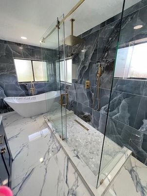 Bathroom, Free Standing Baths, Glass Shower, Interior, Marble, Marble Walls, Recessed Lighting
