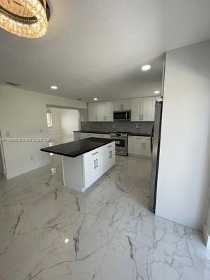 Interior, Kitchen, Marble, Recessed Lighting, Stainless Steel Appliances