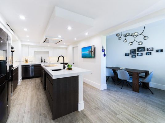 Dining room, Interior, Kitchen, Pendant Lights, Recessed Lighting, Stainless Steel Appliances, Wood Texture Flooring