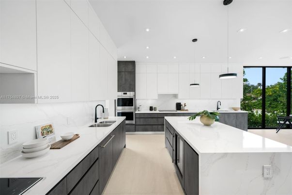 Interior, Kitchen, Marble Walls, Pendant Lights, Recessed Lighting, Stainless Steel Appliances, Wood Texture Flooring