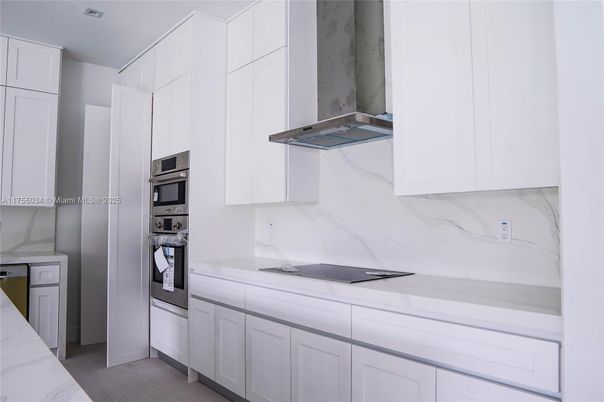 Interior, Kitchen, Marble Walls, Stainless Steel Appliances