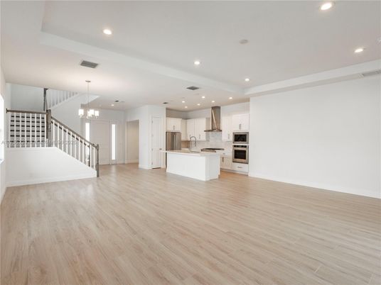 Chandelier, Interior, Kitchen, Pendant Lights, Recessed Lighting, Stainless Steel Appliances, Wood Texture Flooring