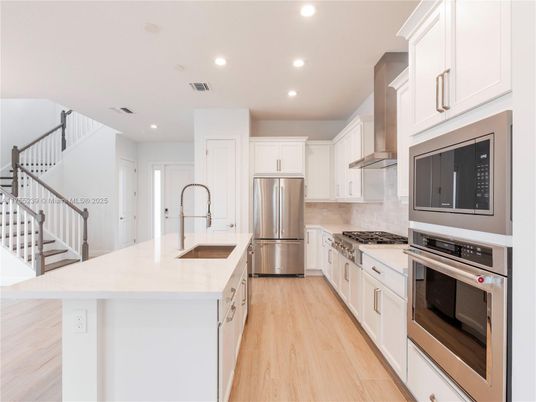Interior, Kitchen, Recessed Lighting, Stainless Steel Appliances, Wood Texture Flooring