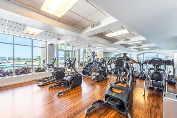 Fitness Equipment, Gym, Interior, Recessed Lighting, Water, Wood Texture Flooring