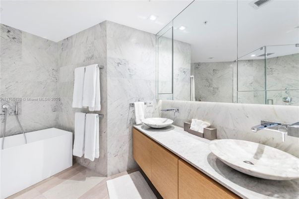 Bathroom, Dual Sink Vanities, Glass Shower, Interior, Marble Walls, Recessed Lighting