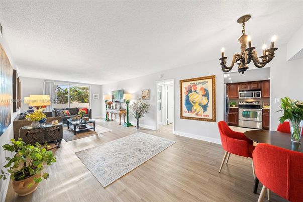 Chandelier, Dining room, Interior, Kitchen, Living room, Stainless Steel Appliances, Wood Texture Flooring