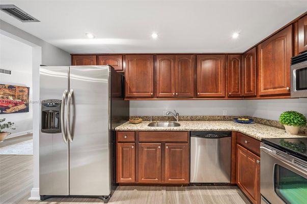 Interior, Kitchen, Recessed Lighting, Stainless Steel Appliances, Wood Texture Flooring