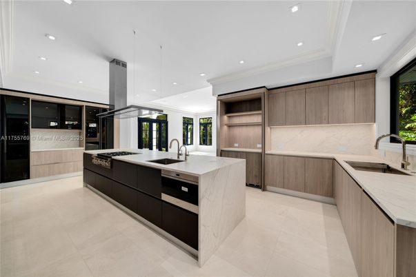 Interior, Kitchen, Marble Walls, Pendant Lights, Recessed Lighting, Stainless Steel Appliances