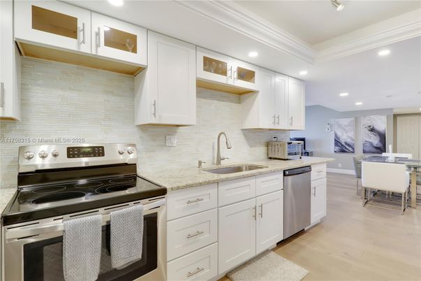 Dining room, Interior, Kitchen, Recessed Lighting, Stainless Steel Appliances, Wood Texture Flooring