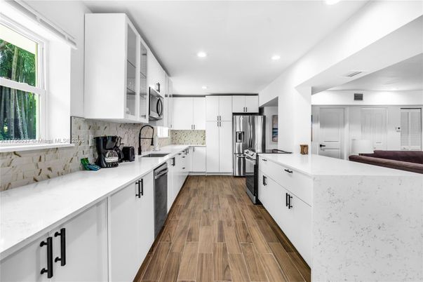 Interior, Kitchen, Recessed Lighting, Stainless Steel Appliances, Wood Texture Flooring