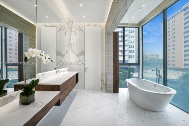 Bathroom, Dual Sink Vanities, Free Standing Baths, Glass Shower, Interior, Marble, Marble Walls, Recessed Lighting