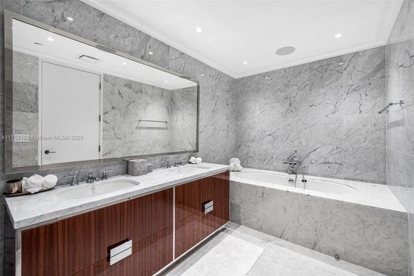 Bathroom, Dual Sink Vanities, Glass Shower, Interior, Marble Walls, Recessed Lighting