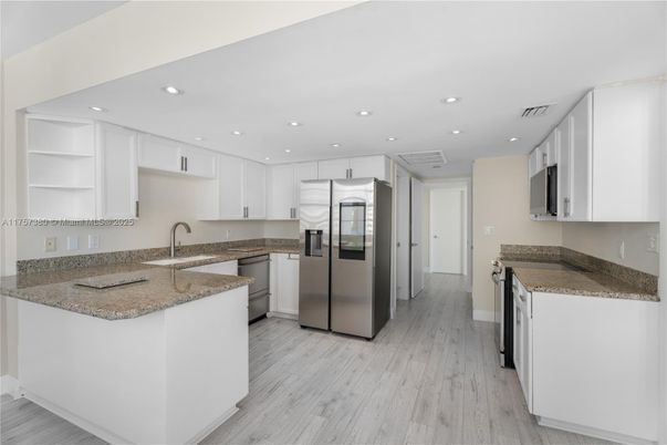 Interior, Kitchen, Recessed Lighting, Stainless Steel Appliances, Wood Texture Flooring