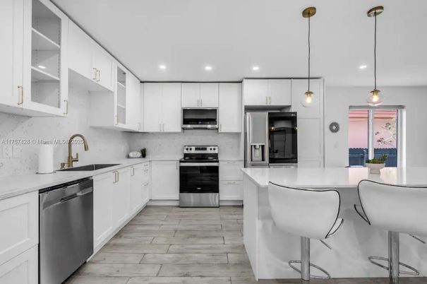 Interior, Kitchen, Pendant Lights, Recessed Lighting, Stainless Steel Appliances, Wood Texture Flooring