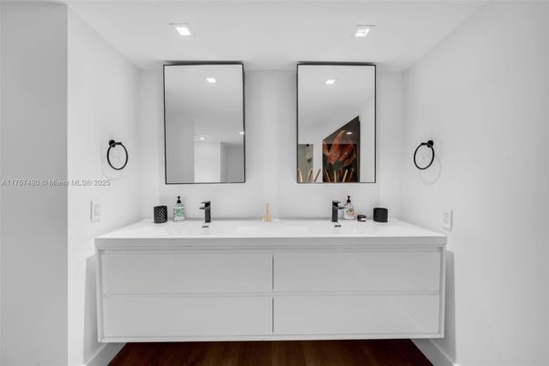 Bathroom, Dual Sink Vanities, Interior, Recessed Lighting, Wood Texture Flooring