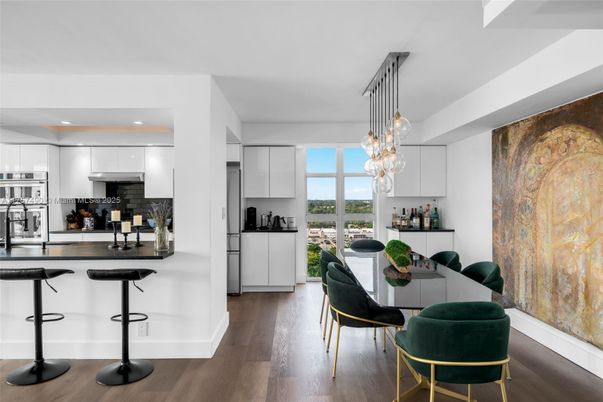 Dining room, Interior, Kitchen, Pendant Lights, Recessed Lighting, Stainless Steel Appliances, Wood Texture Flooring