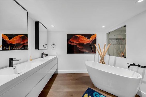Bathroom, Dual Sink Vanities, Free Standing Baths, Interior, Recessed Lighting, Wood Texture Flooring