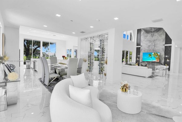 Dining room, Fireplace, Interior, Living room, Marble, Recessed Lighting, Wine Storage