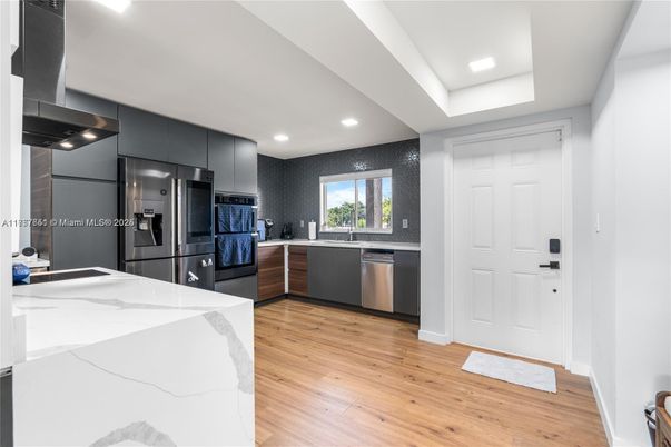 Interior, Kitchen, Recessed Lighting, Stainless Steel Appliances, Wood Texture Flooring