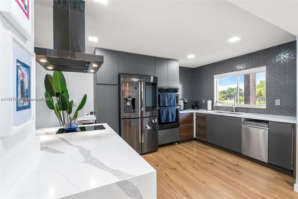 Interior, Kitchen, Recessed Lighting, Stainless Steel Appliances, Wood Texture Flooring