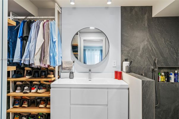 Bathroom, Dual Sink Vanities, Interior, Recessed Lighting, Walk-in Closets