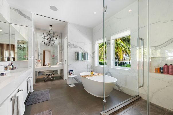 Bathroom, Dual Sink Vanities, Free Standing Baths, Glass Shower, Interior, Marble Walls, Recessed Lighting