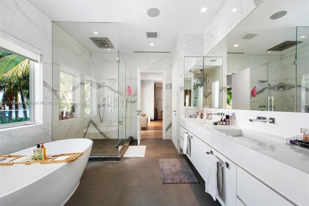 Bathroom, Dual Sink Vanities, Free Standing Baths, Glass Shower, Interior, Marble Walls, Recessed Lighting