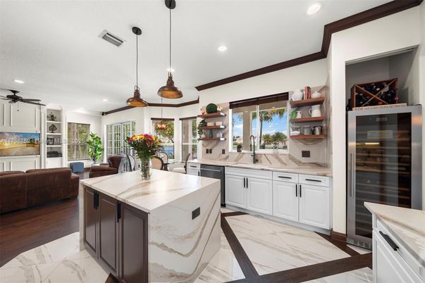 Interior, Kitchen, Marble, Pendant Lights, Recessed Lighting, Stainless Steel Appliances, Wood Texture Flooring
