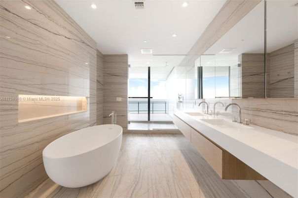 Bathroom, Dual Sink Vanities, Free Standing Baths, Glass Shower, Interior, Marble, Marble Walls, Recessed Lighting, Wood Texture Flooring