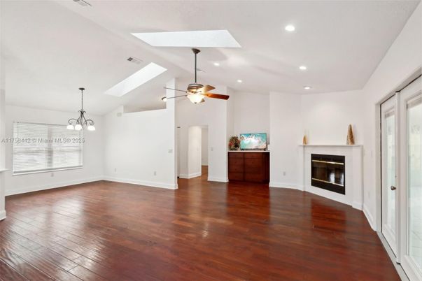 Empty room, Fireplace, Interior, Recessed Lighting, Wood Texture Flooring