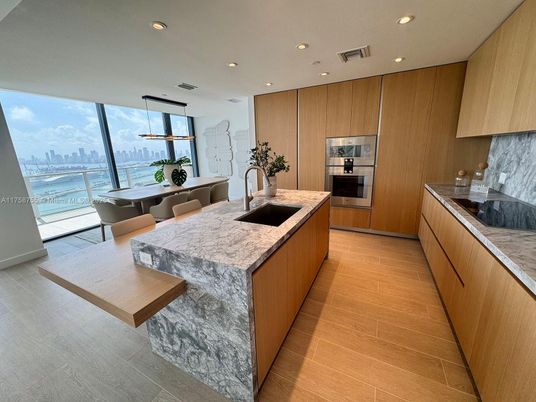 Dining room, Interior, Kitchen, Recessed Lighting, Stainless Steel Appliances, Water, Wood Texture Flooring