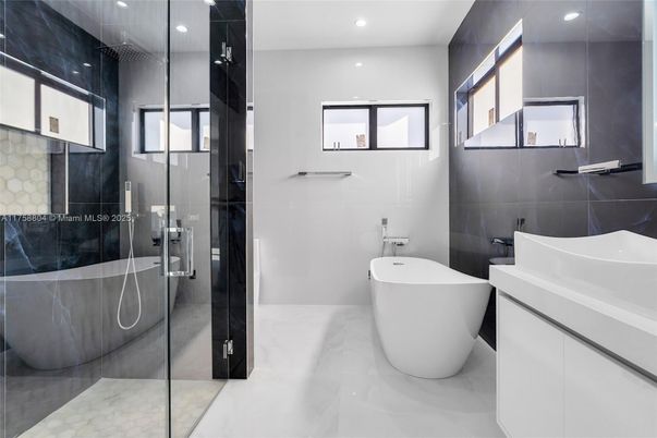 Bathroom, Free Standing Baths, Glass Shower, Interior, Marble, Marble Walls, Recessed Lighting