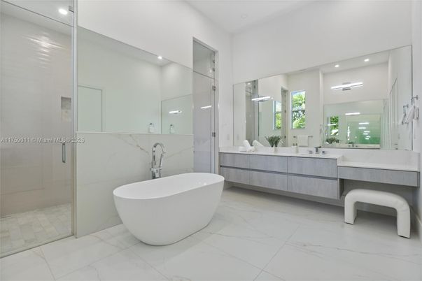 Bathroom, Dual Sink Vanities, Free Standing Baths, Glass Shower, Interior, Marble, Marble Walls, Recessed Lighting