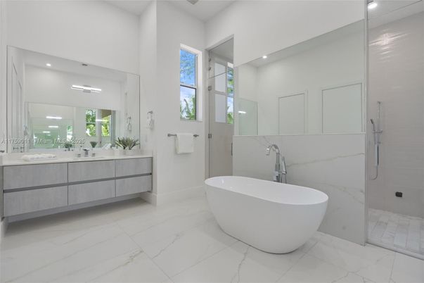 Bathroom, Dual Sink Vanities, Free Standing Baths, Interior, Marble, Marble Walls, Recessed Lighting
