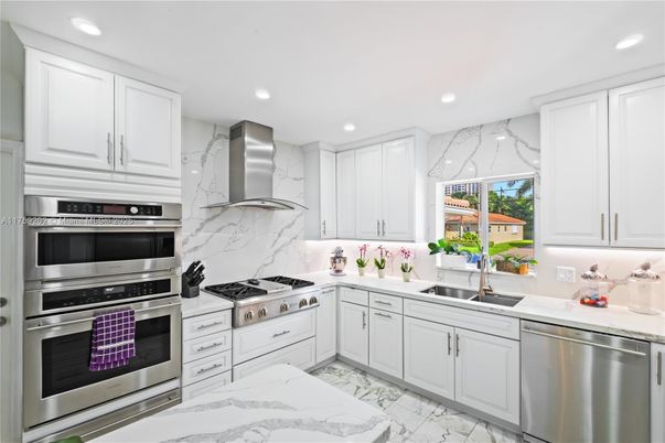 Interior, Kitchen, Marble, Marble Walls, Recessed Lighting, Stainless Steel Appliances