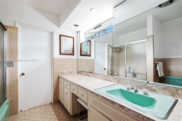 Bathroom, Dual Sink Vanities, Glass Shower, Interior, Recessed Lighting, Tile Countertops