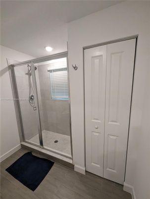 Bathroom, Glass Shower, Interior, Recessed Lighting, Wood Texture Flooring
