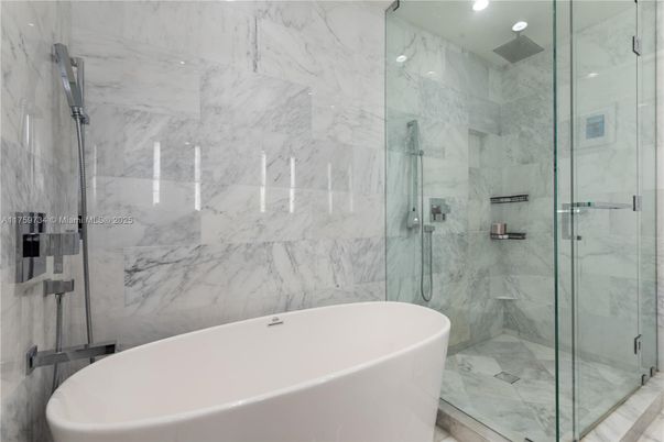 Bathroom, Free Standing Baths, Glass Shower, Interior, Marble Walls, Recessed Lighting