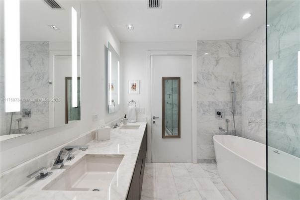 Bathroom, Dual Sink Vanities, Free Standing Baths, Glass Shower, Interior, Marble, Marble Walls, Recessed Lighting