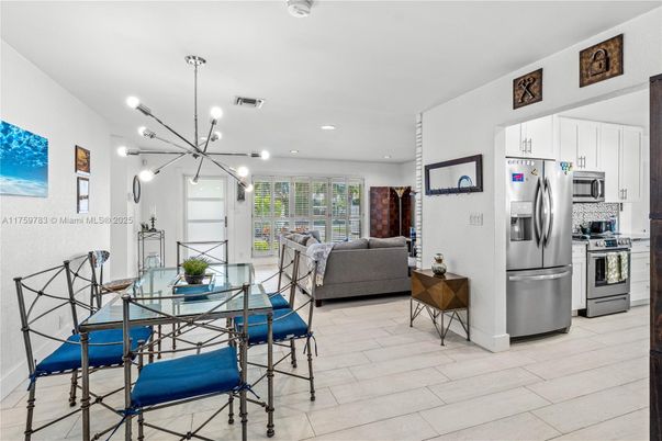 Dining room, Interior, Kitchen, Living room, Pendant Lights, Recessed Lighting, Stainless Steel Appliances, Wood Texture Flooring