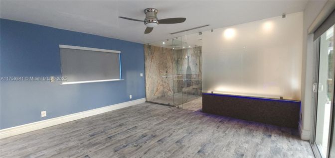 Bathroom, Empty room, Glass Shower, Interior, Recessed Lighting, Wood Texture Flooring