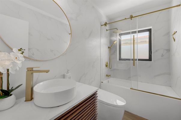 Bathroom, Glass Shower, Interior, Marble Walls, Wood Texture Flooring